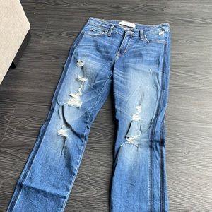 Flying monkey ripped blue jeans. Flared leg